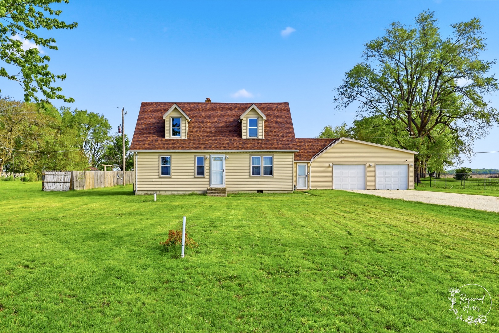 1769 West 2000S Road Kankakee, IL 60901 - Photo 2 of 39 a front view of a house with a yard