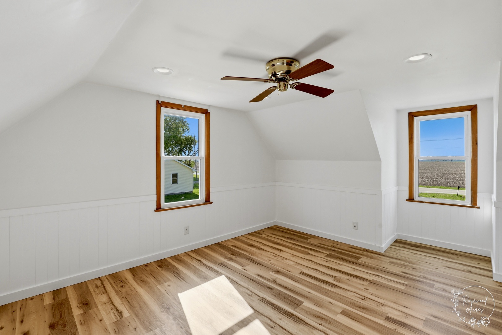 1769 West 2000S Road Kankakee, IL 60901 - Photo 21 of 39 a view of a room with a window and a ceiling fan
