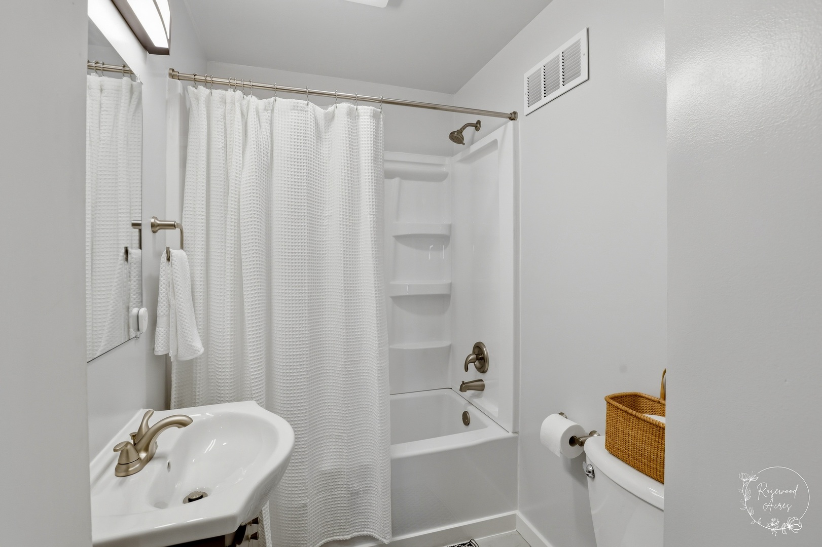 1769 West 2000S Road Kankakee, IL 60901 - Photo 24 of 39 a bathroom with a sink a toilet and shower