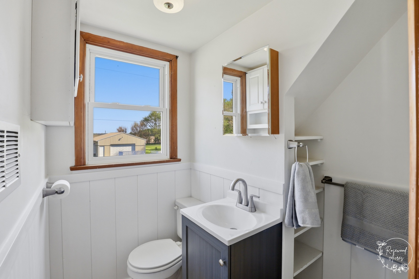 1769 West 2000S Road Kankakee, IL 60901 - Photo 25 of 39 a bathroom with a toilet sink and mirror