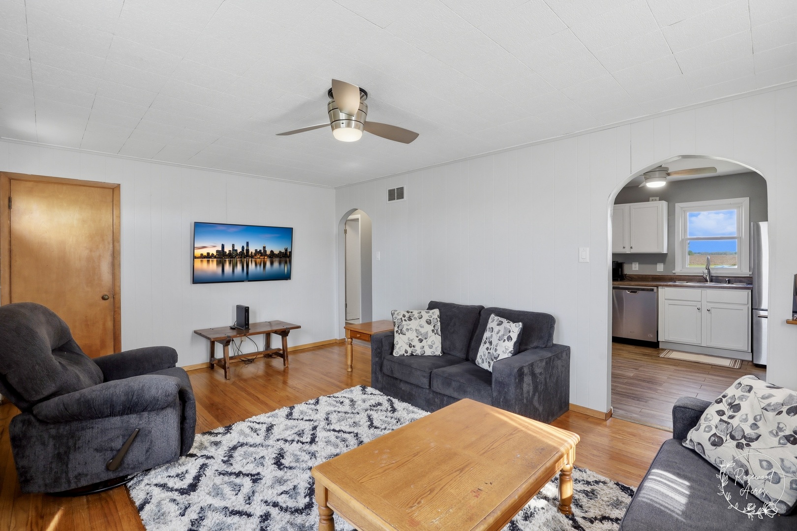 1769 West 2000S Road Kankakee, IL 60901 - Photo 7 of 39 a living room with furniture and a view of kitchen