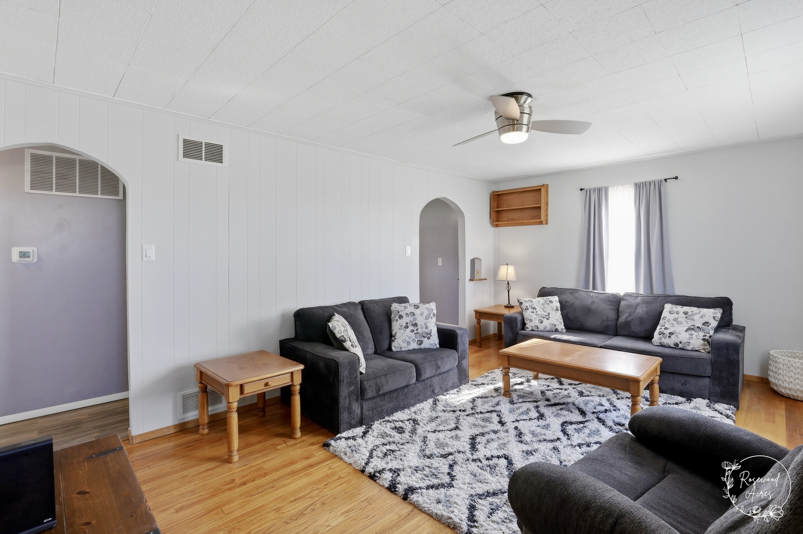 1769 West 2000S Road Kankakee, IL 60901 - Photo 8 of 39 a living room with furniture and a rug