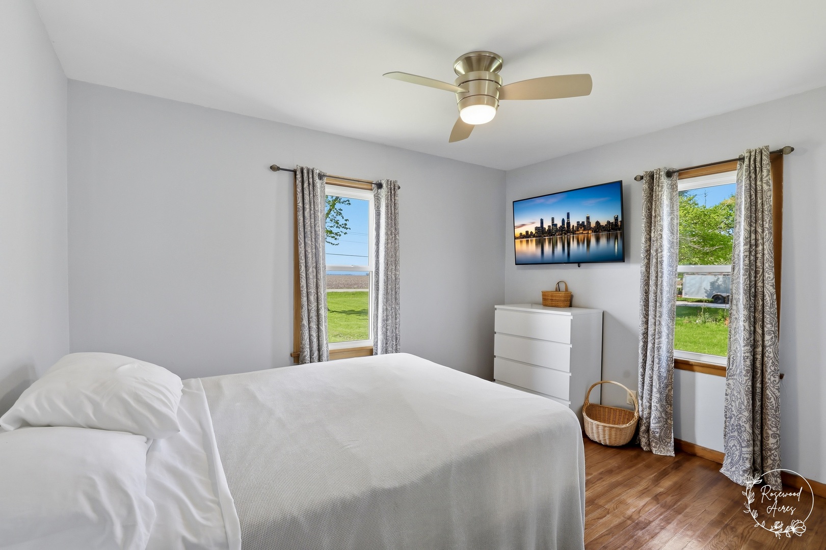1769 West 2000S Road Kankakee, IL 60901 - Photo 10 of 39 a bedroom with a bed and a chandelier