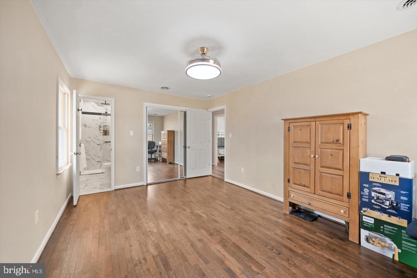 436 Castleton Road Castleton, VA 22716 - Photo 32 of 48 Spacious room with warm wooden floors.