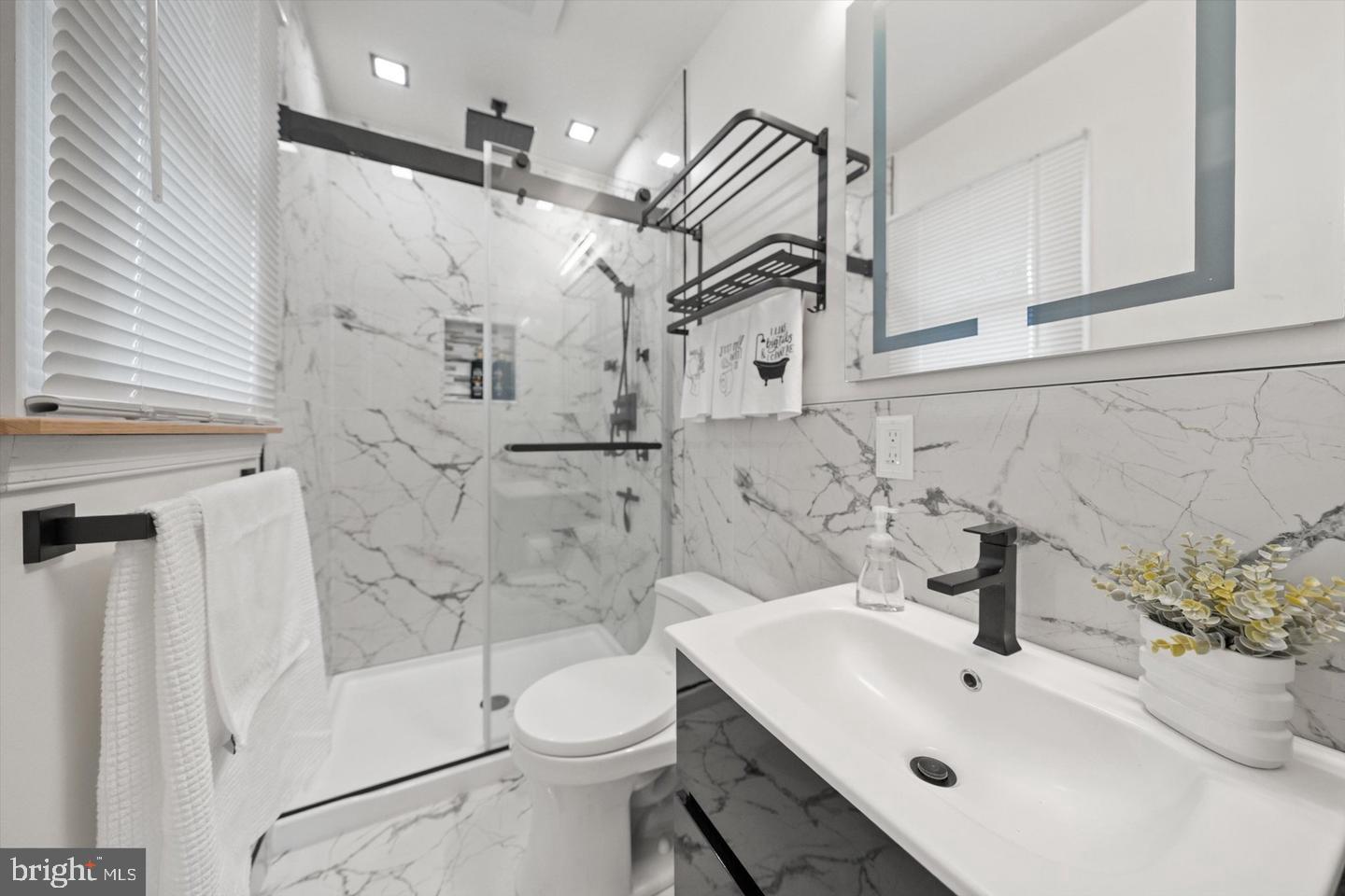 436 Castleton Road Castleton, VA 22716 - Photo 33 of 48 Sleek marble bathroom oasis.