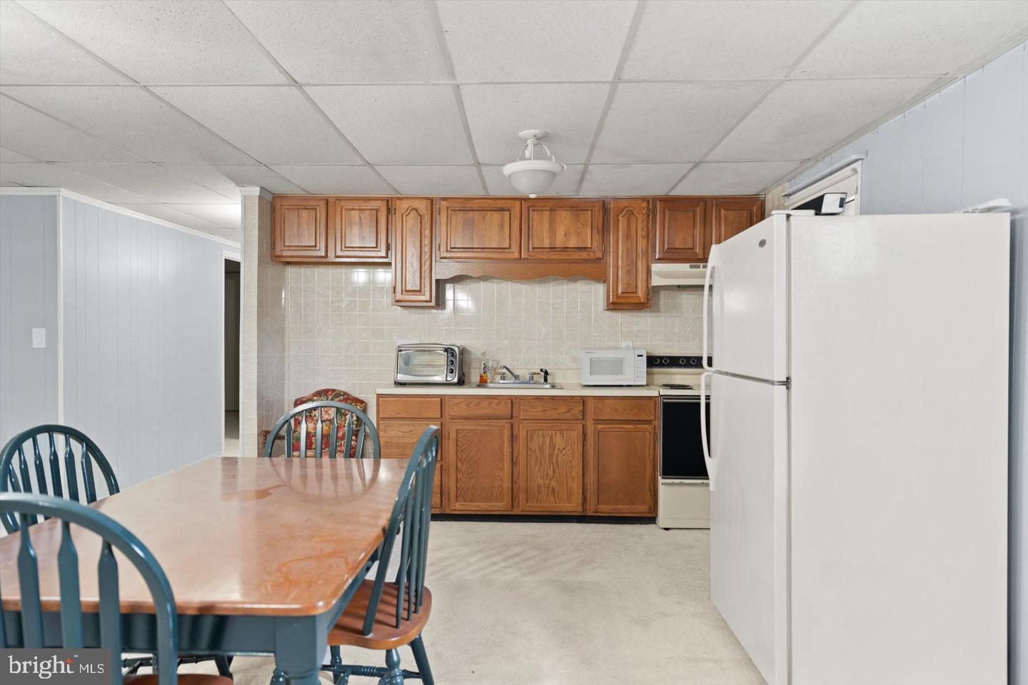 436 Castleton Road Castleton, VA 22716 - Photo 35 of 48 Cozy kitchen with warm wooden accents.