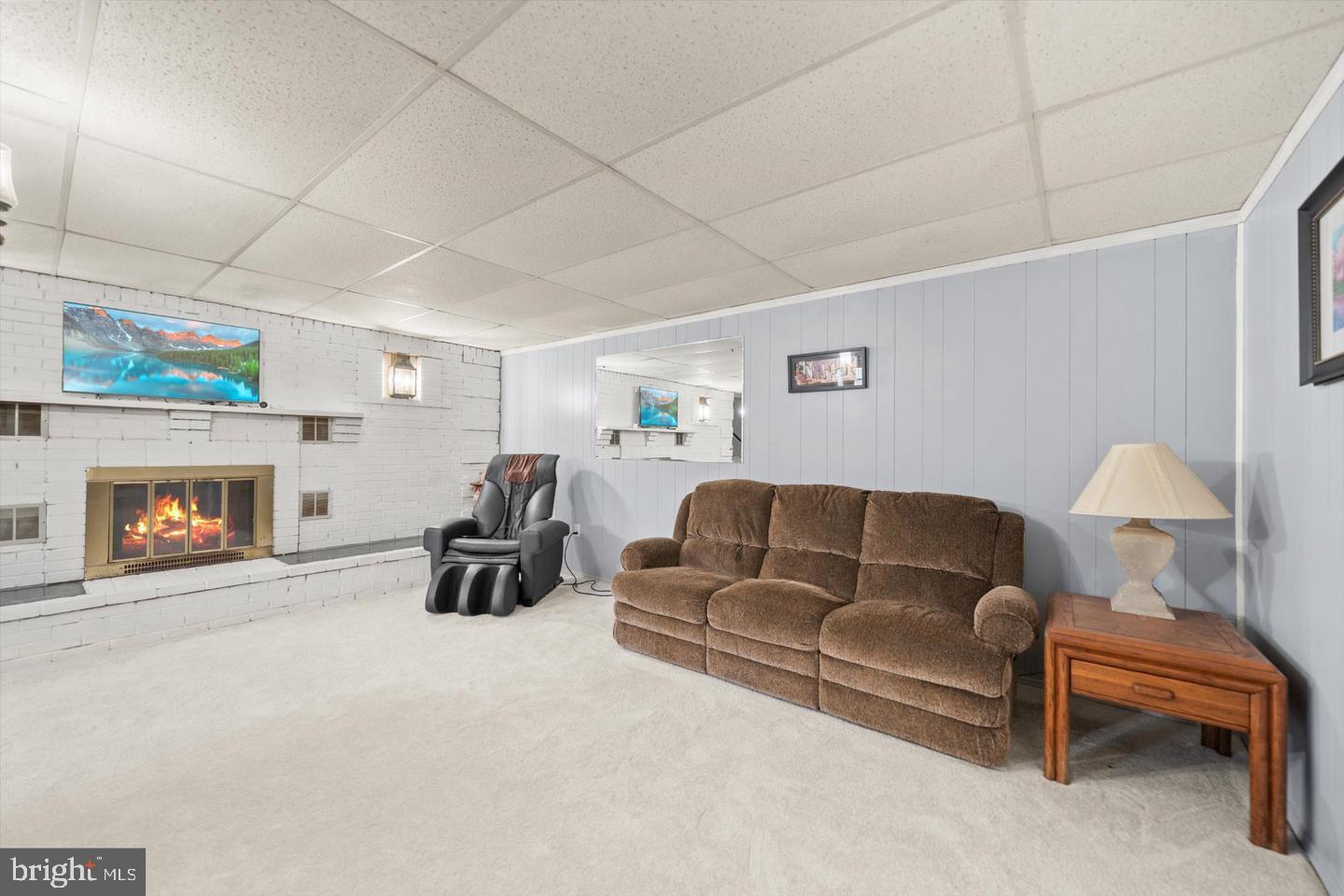 436 Castleton Road Castleton, VA 22716 - Photo 37 of 48 Cozy basement retreat with fireplace.