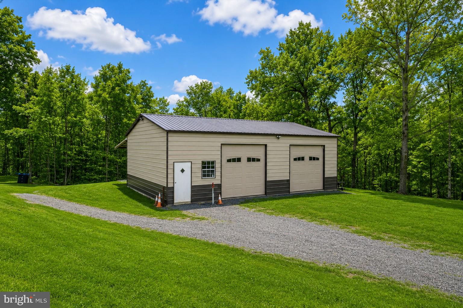 436 Castleton Road Castleton, VA 22716 - Photo 41 of 48 Spacious garage nestled in nature.