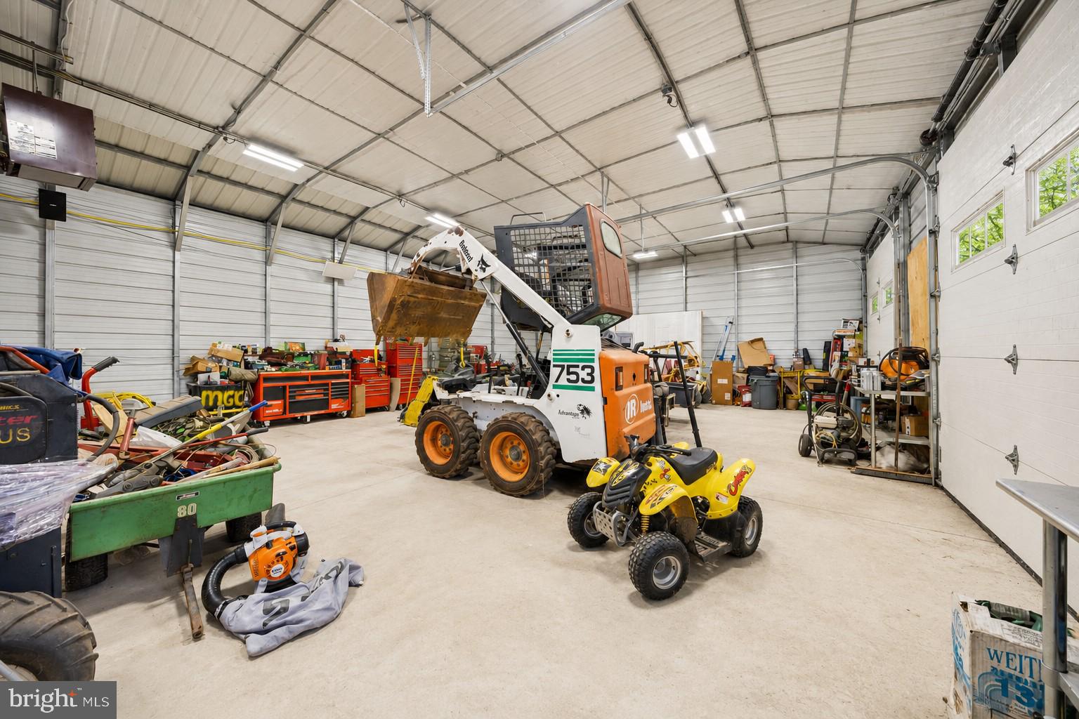 436 Castleton Road Castleton, VA 22716 - Photo 45 of 48 Spacious workshop with heavy machinery.