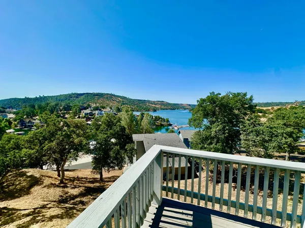 a balcony with an outdoor space