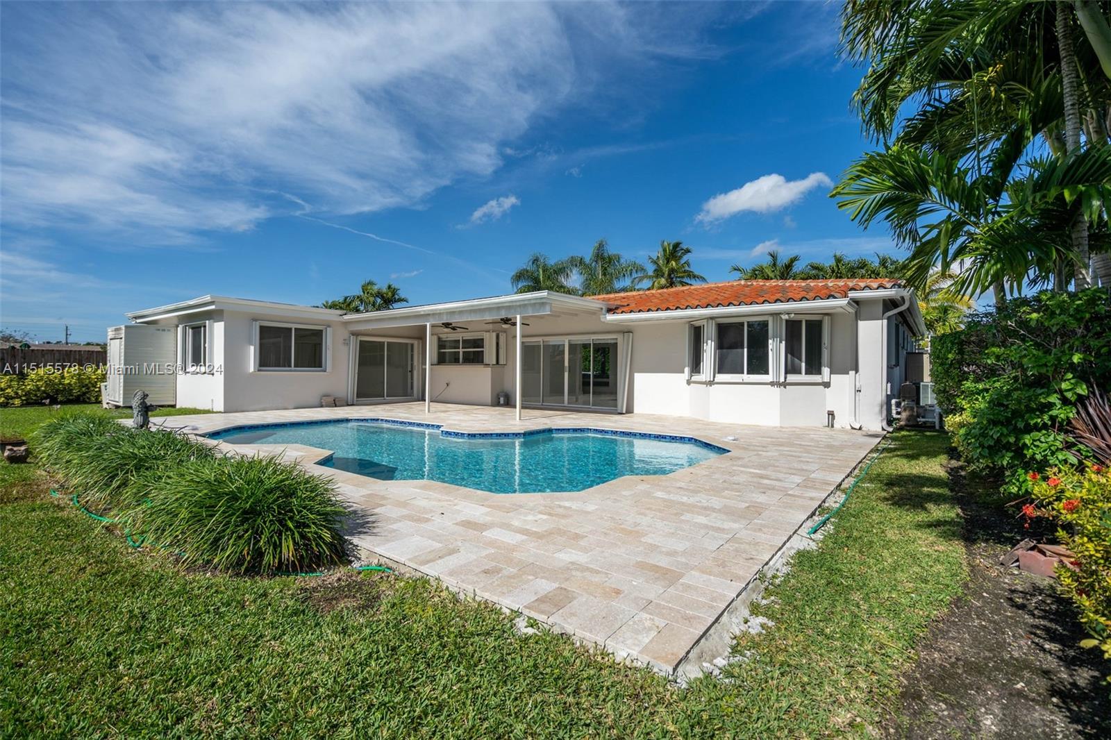 10540 Southwest 98th Street Miami, FL 33176 - Photo 15 of 21 a house view with a garden space