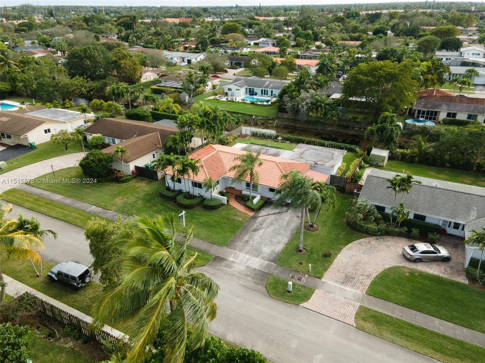 10540 Southwest 98th Street Miami, FL 33176 - Photo 18 of 21 an aerial view of a house with a garden