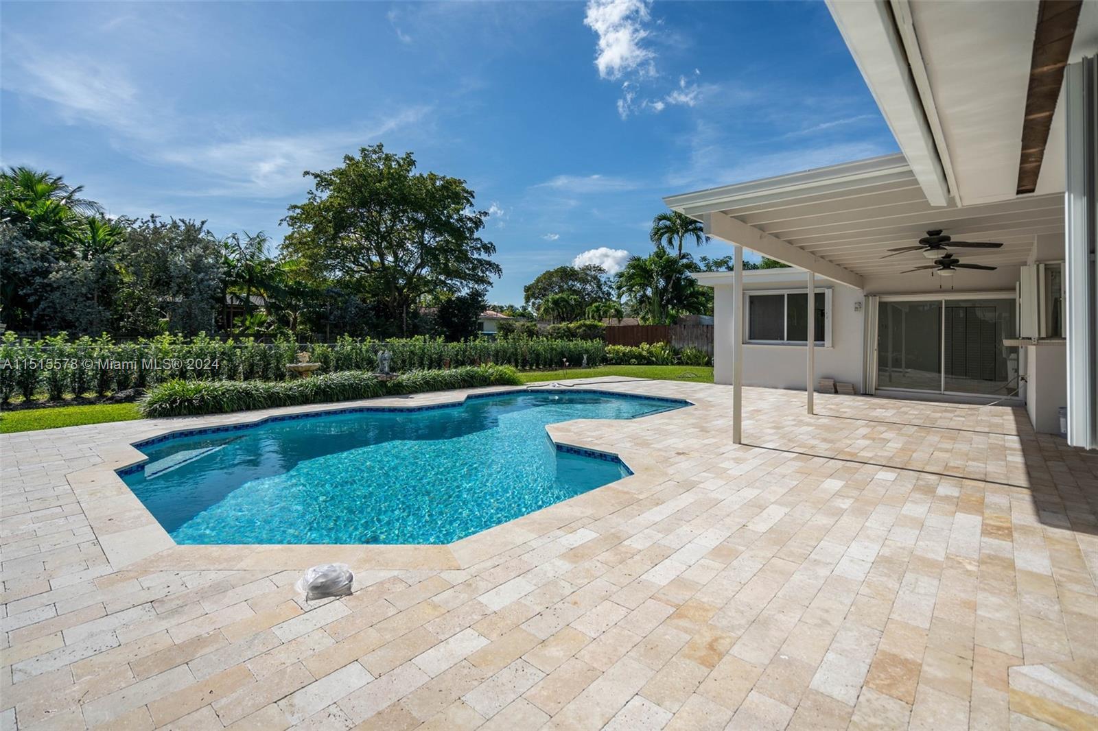 10540 Southwest 98th Street Miami, FL 33176 - Photo 2 of 21 a view of outdoor space yard swimming pool and outdoor seating
