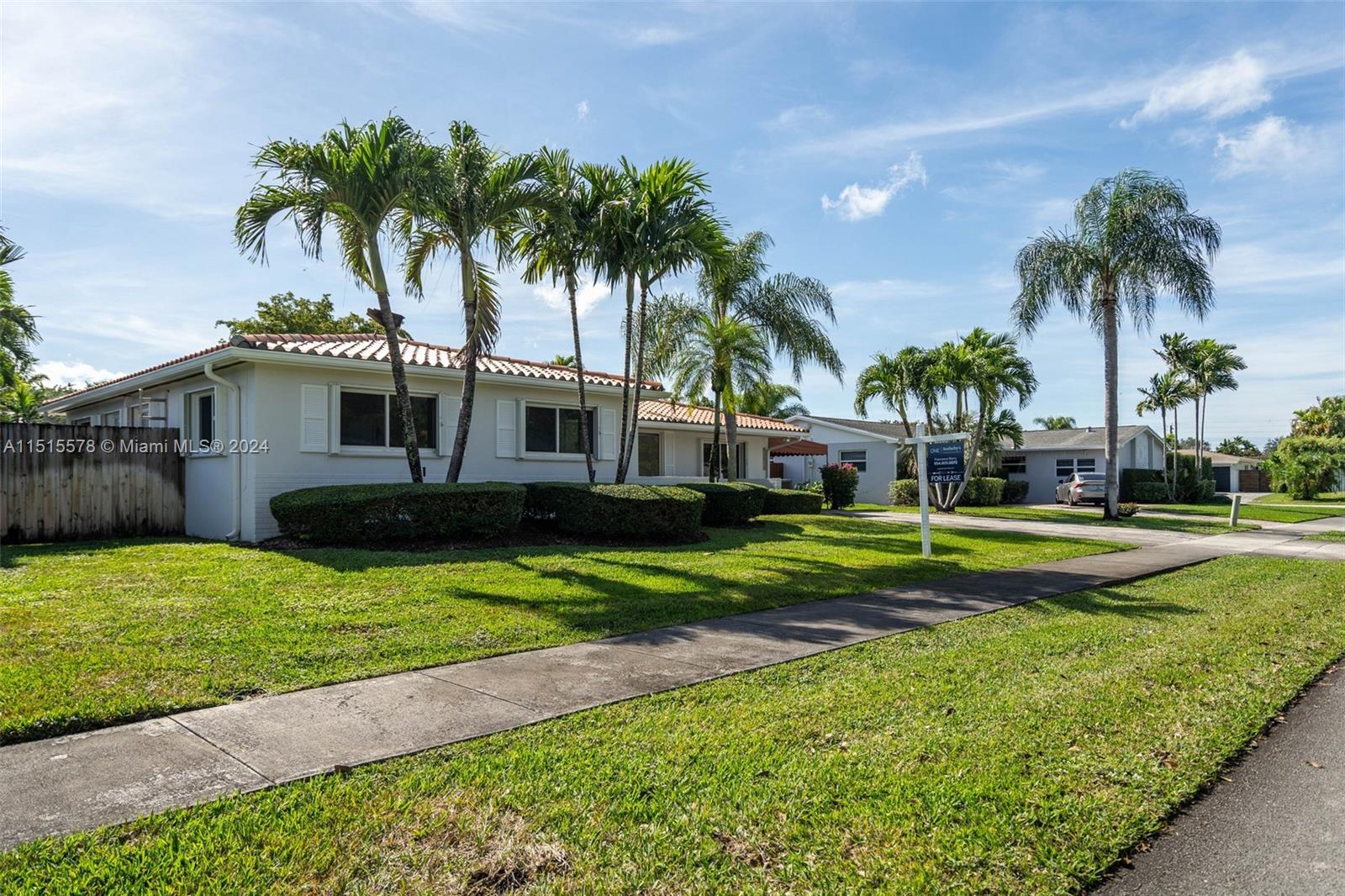 10540 Southwest 98th Street Miami, FL 33176 - Photo 21 of 21 a view of a house with swimming pool and a yard