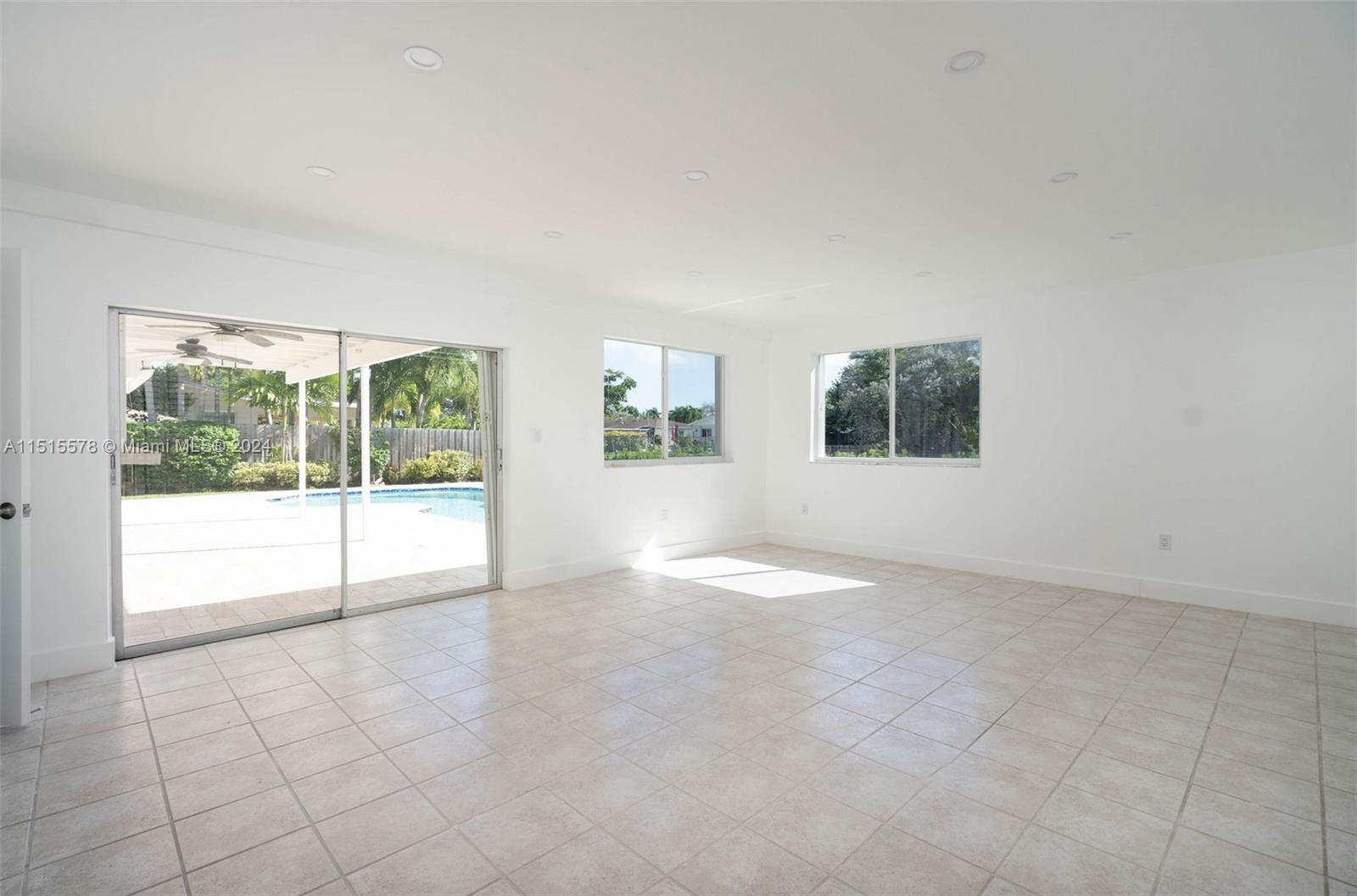 10540 Southwest 98th Street Miami, FL 33176 - Photo 8 of 21 a view of an empty room with a window