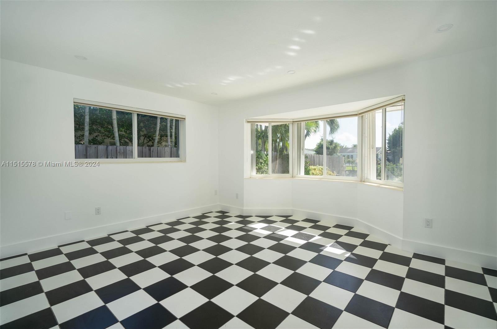 10540 Southwest 98th Street Miami, FL 33176 - Photo 9 of 21 a black and white checkered floor