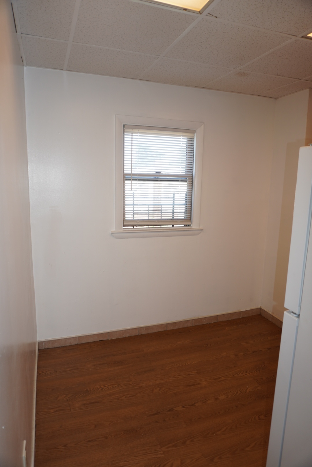 441 Castleton Avenue, Unit 2 Staten Island, NY 10301 - Photo 6 of 10 an empty room with a window