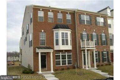 20215 Edisto Square Ashburn, VA 20147 - Photo 1 of 1 a front view of a building with a garden