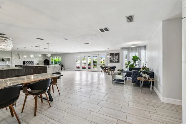 a kitchen with stainless steel appliances granite countertop a stove and a sink