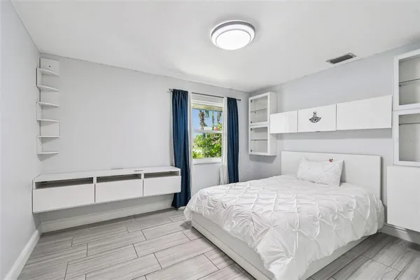 an aerial view of a house with a garden