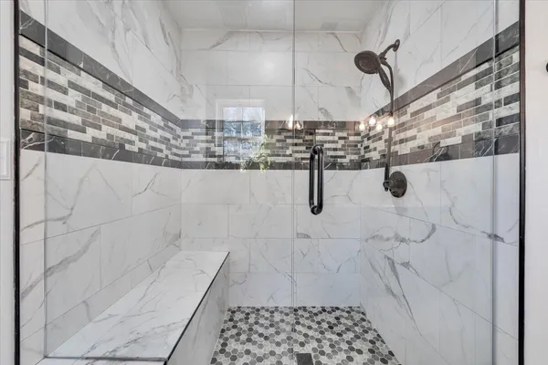 a view of a patio with table and chairs with wooden floor and fence