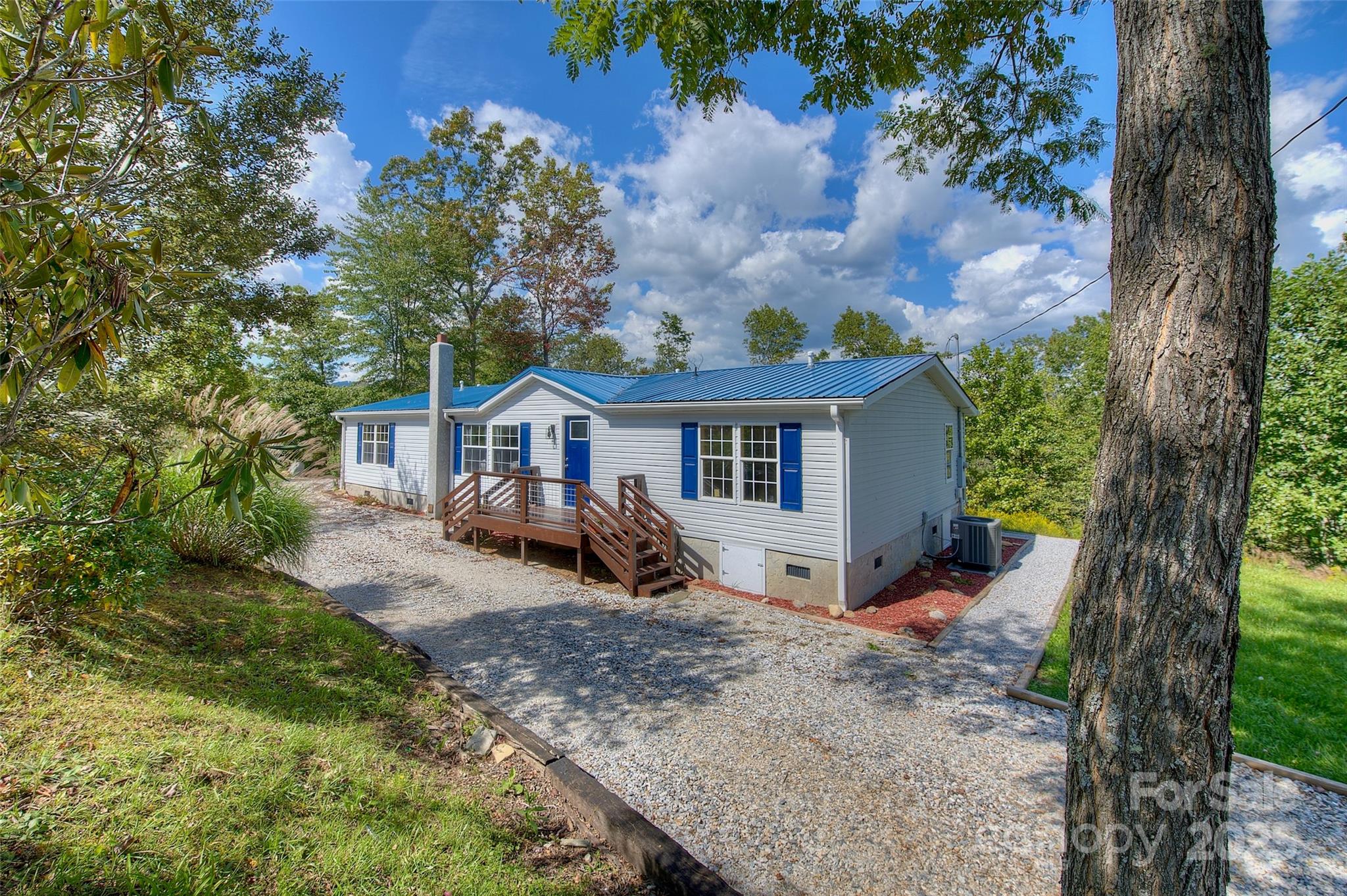 front view of a house with a yard