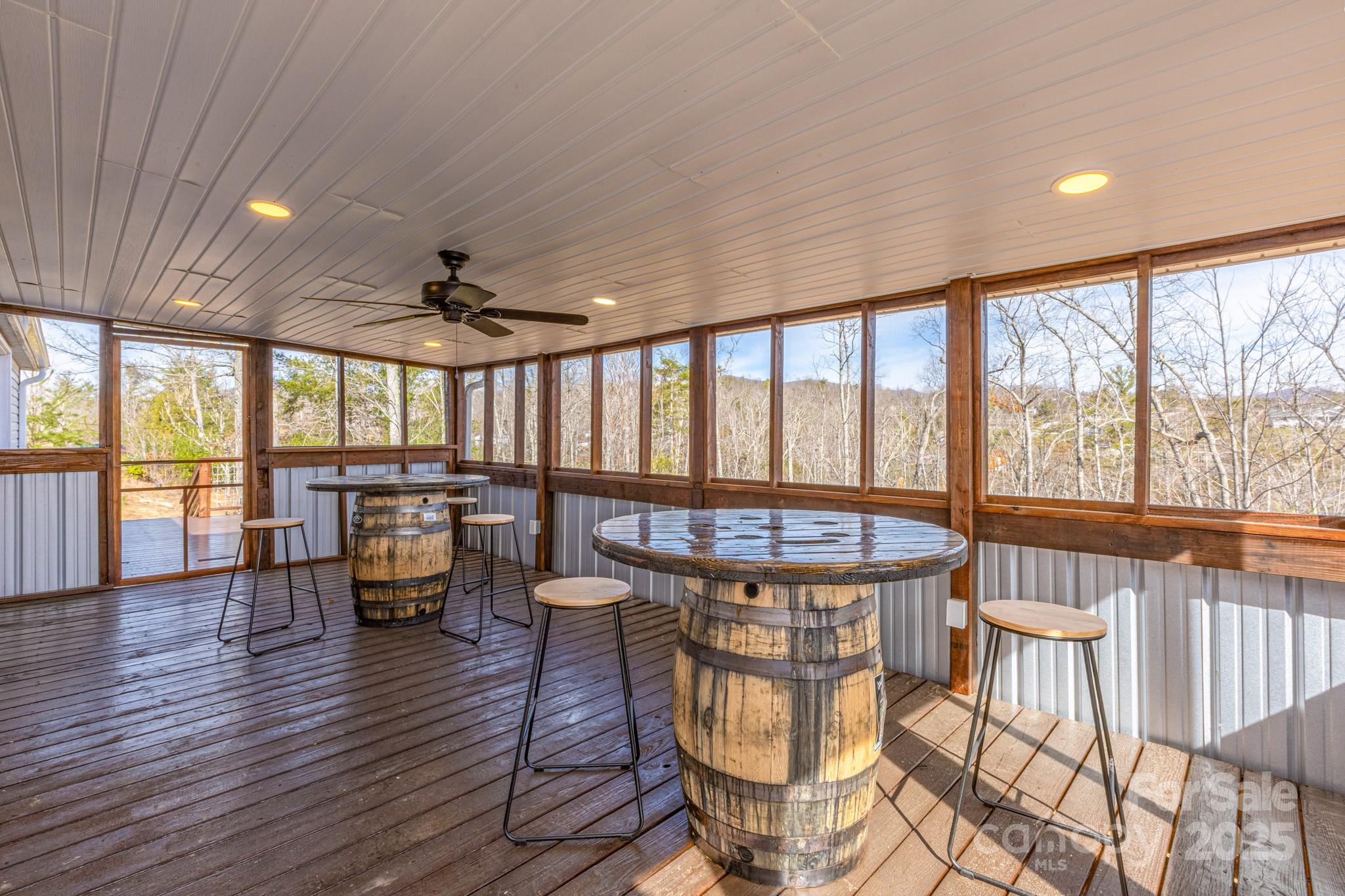 459 Vaughan Road Spruce Pine, NC 28777 - Photo 25 of 35 a view of a dining room with furniture window and wooden floor
