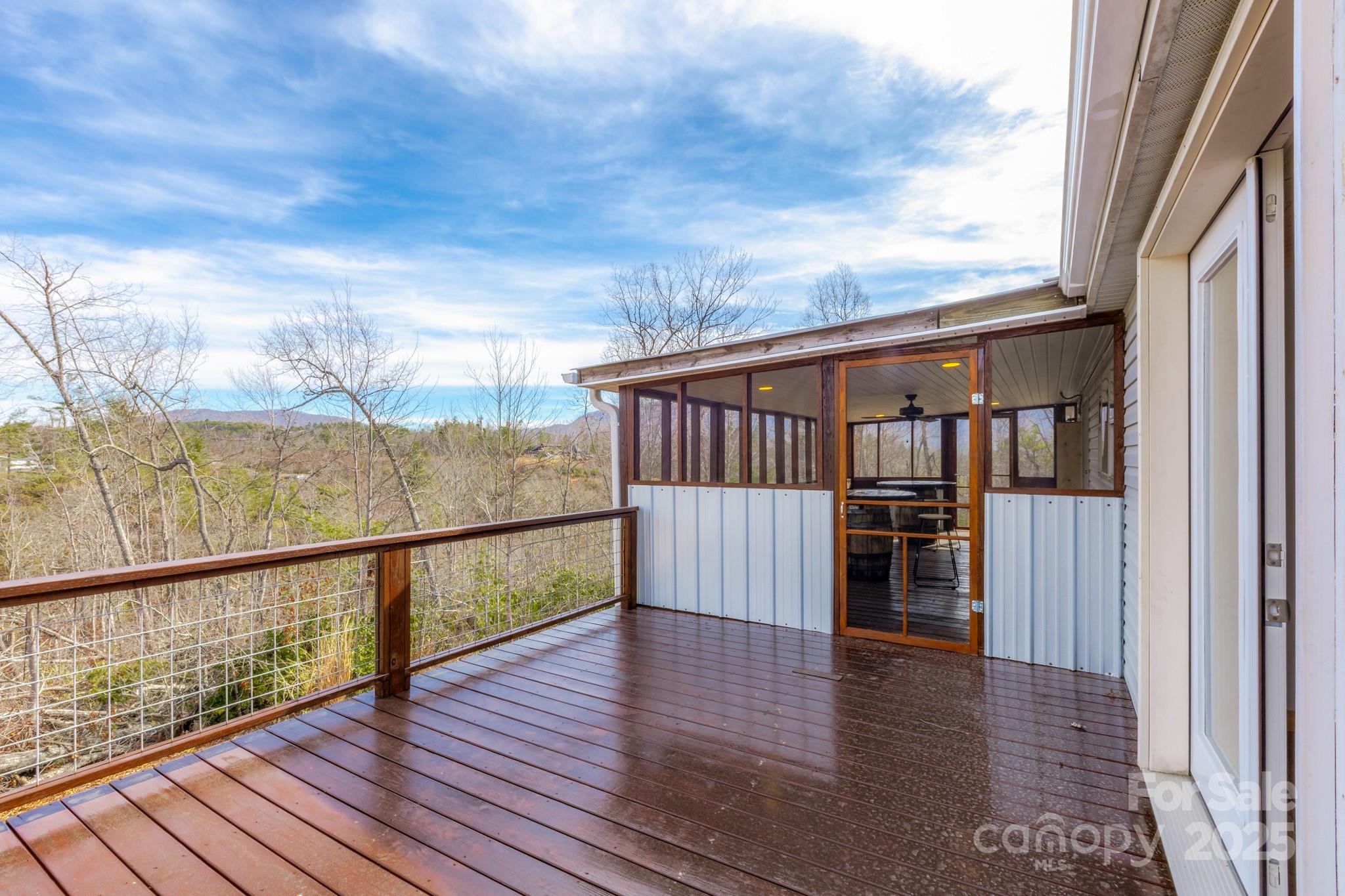 459 Vaughan Road Spruce Pine, NC 28777 - Photo 26 of 35 a view of balcony with wooden floor