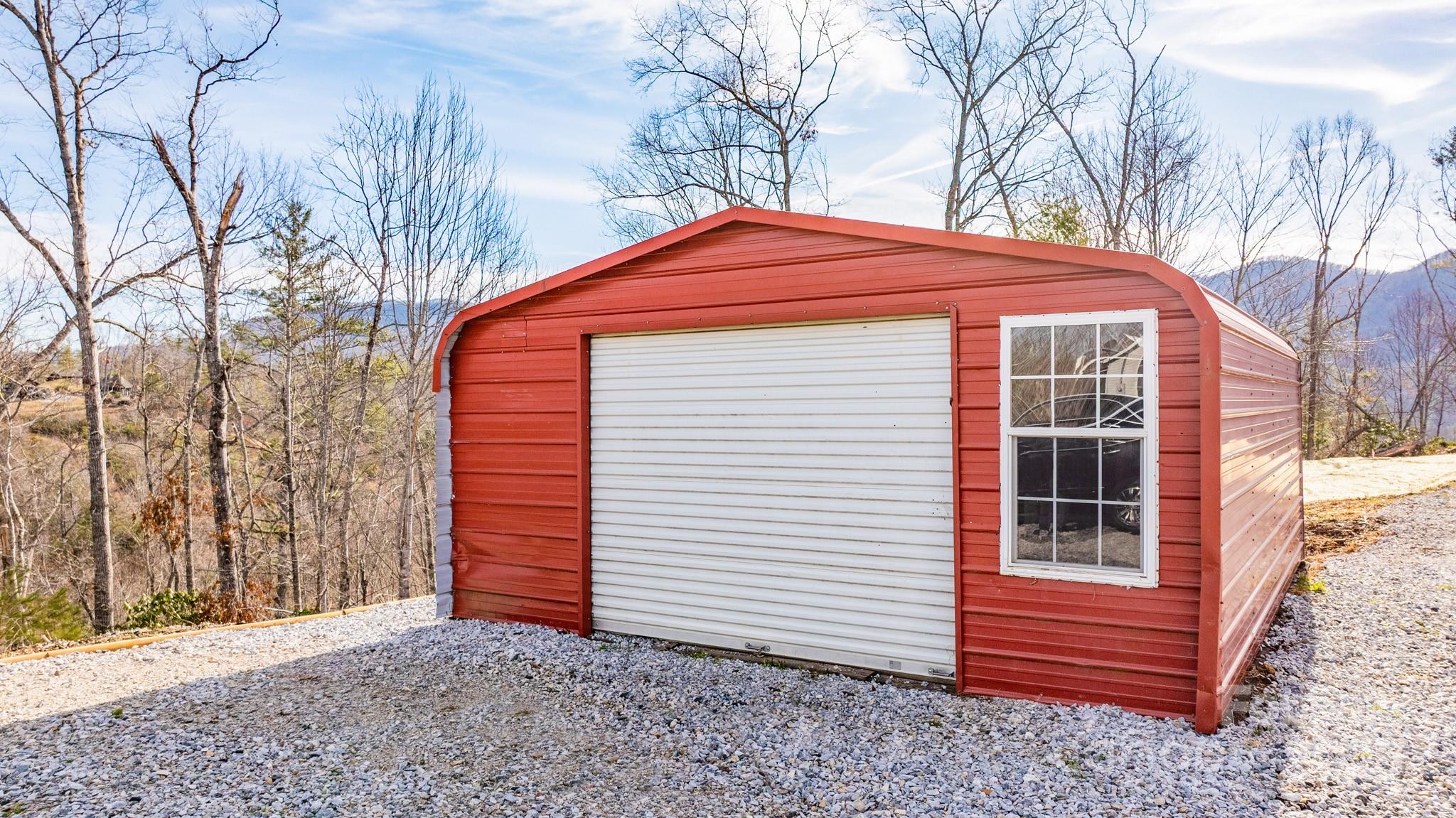 459 Vaughan Road Spruce Pine, NC 28777 - Photo 3 of 35 a front view of a house with a yard