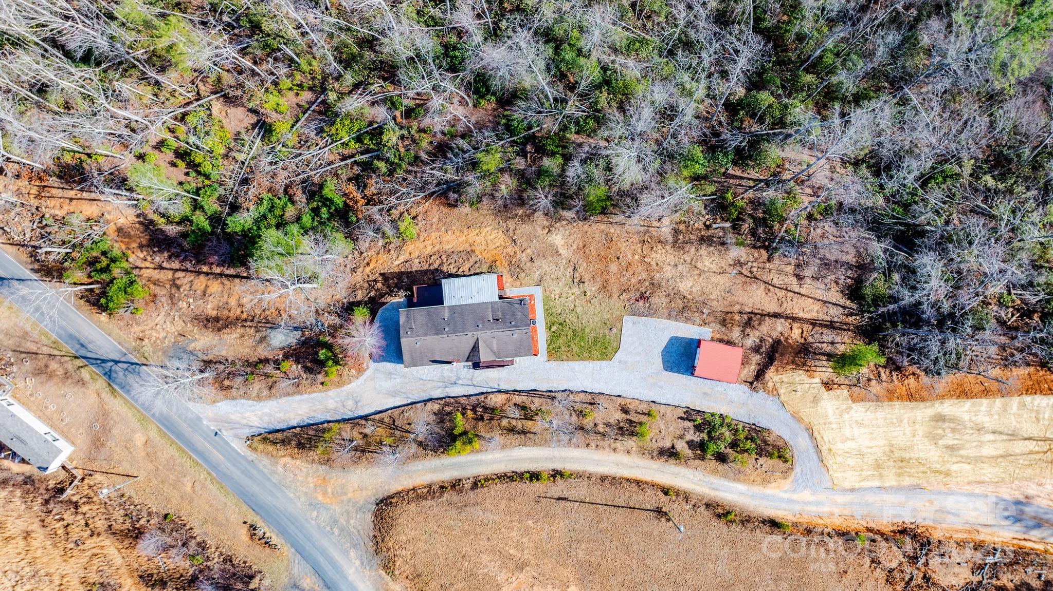 459 Vaughan Road Spruce Pine, NC 28777 - Photo 35 of 35 an aerial view of a house with swimming pool