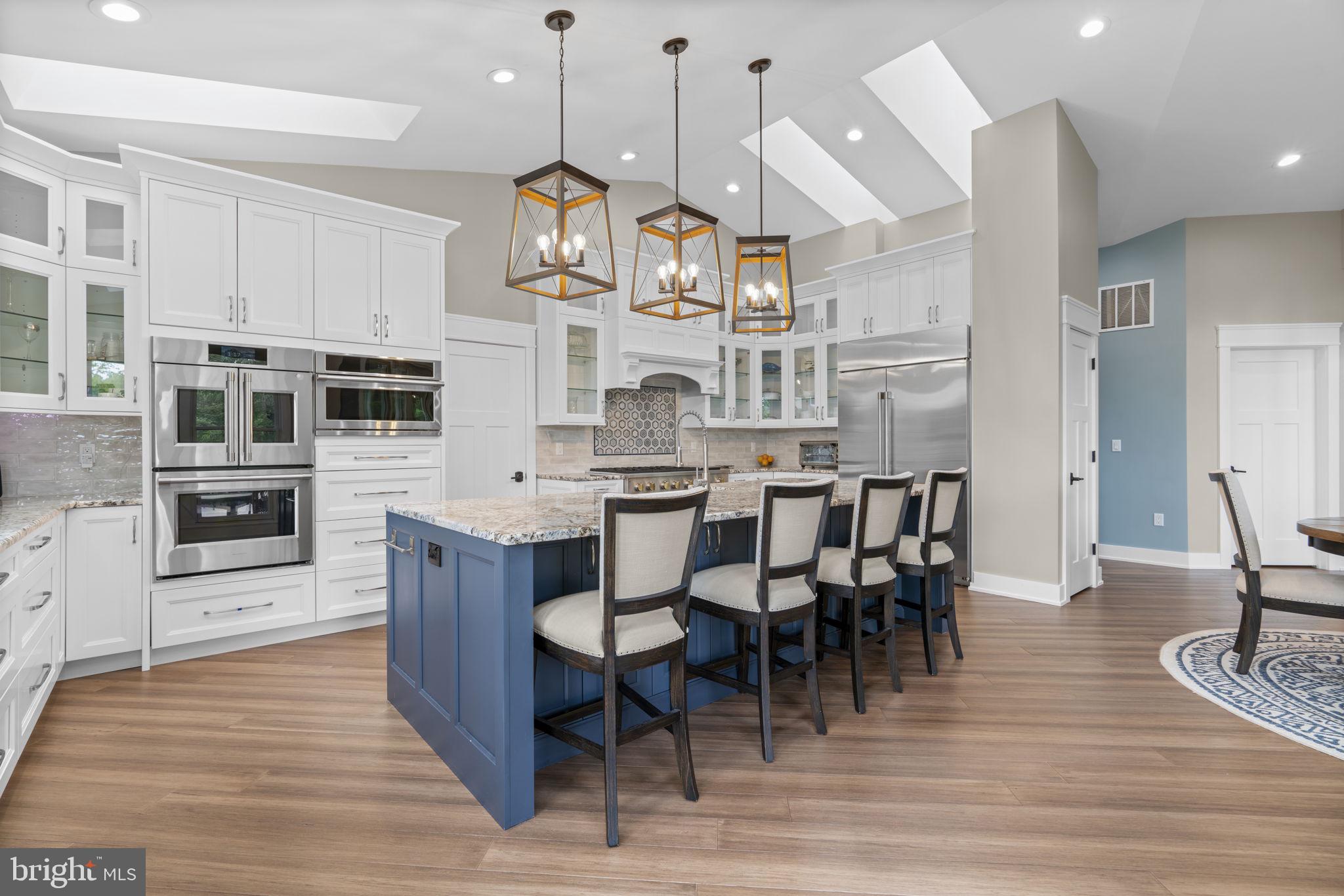 798 Creek View Road Severna Park, MD 21146 - Photo 16 of 72 a large kitchen with lots of counter space and stainless steel appliances