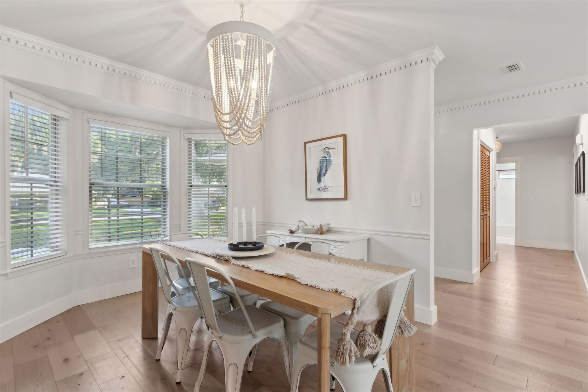 1908 Springbrook Road Fernandina Beach, FL 32034 - Photo 11 of 48 a view of a dining room with furniture wooden floor and chandelier