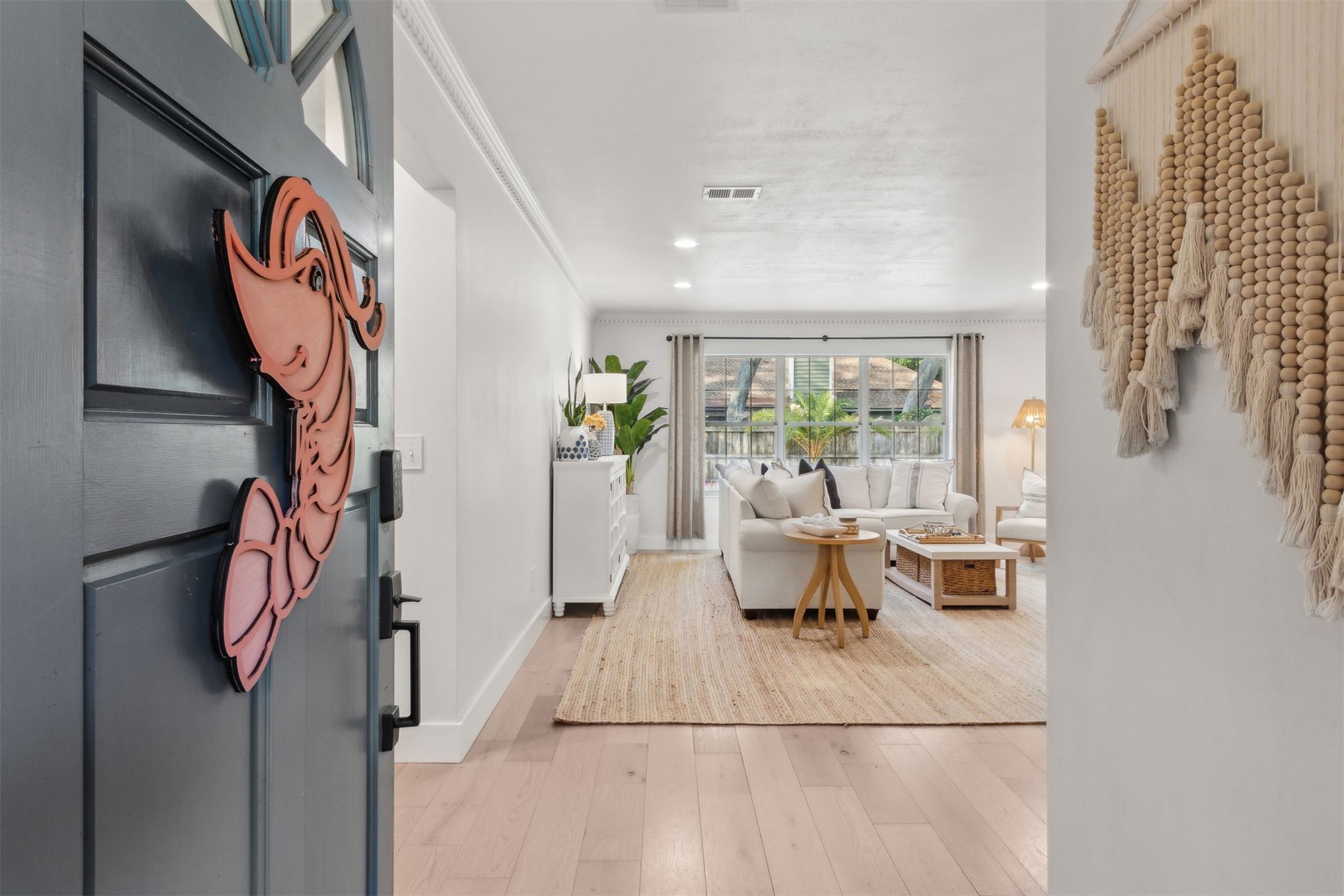 1908 Springbrook Road Fernandina Beach, FL 32034 - Photo 2 of 48 a living room with furniture and a floor to ceiling window