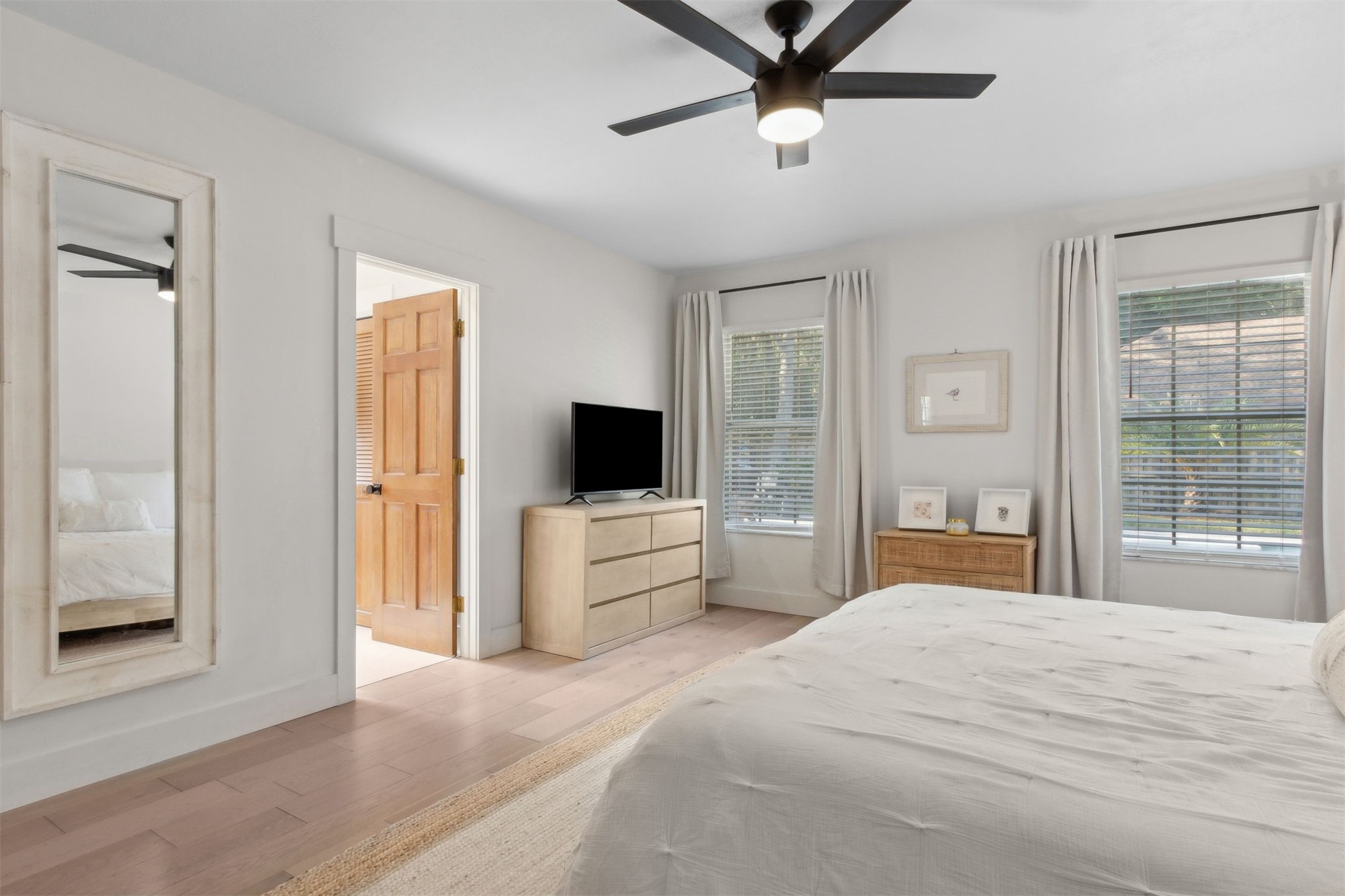 1908 Springbrook Road Fernandina Beach, FL 32034 - Photo 27 of 48 a bedroom with a bed and a flat screen tv