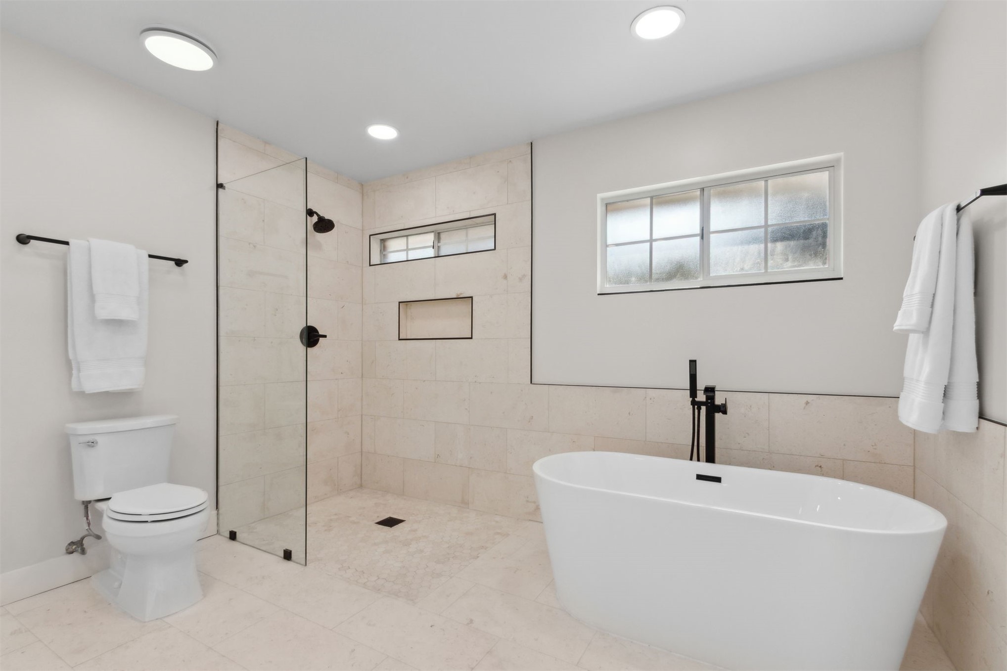 1908 Springbrook Road Fernandina Beach, FL 32034 - Photo 28 of 48 a white bath tub sitting next to a toilet