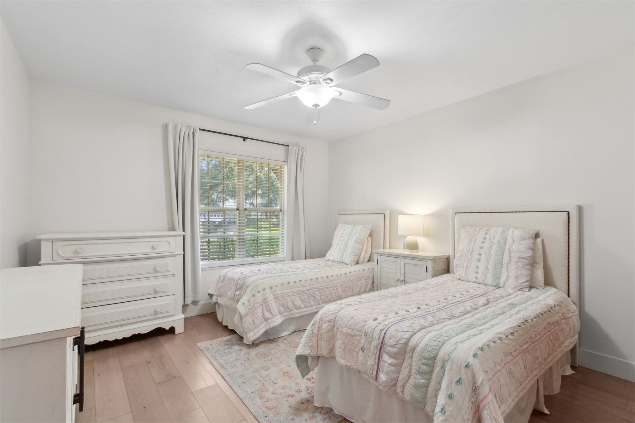 1908 Springbrook Road Fernandina Beach, FL 32034 - Photo 31 of 48 a bedroom with two beds and a window