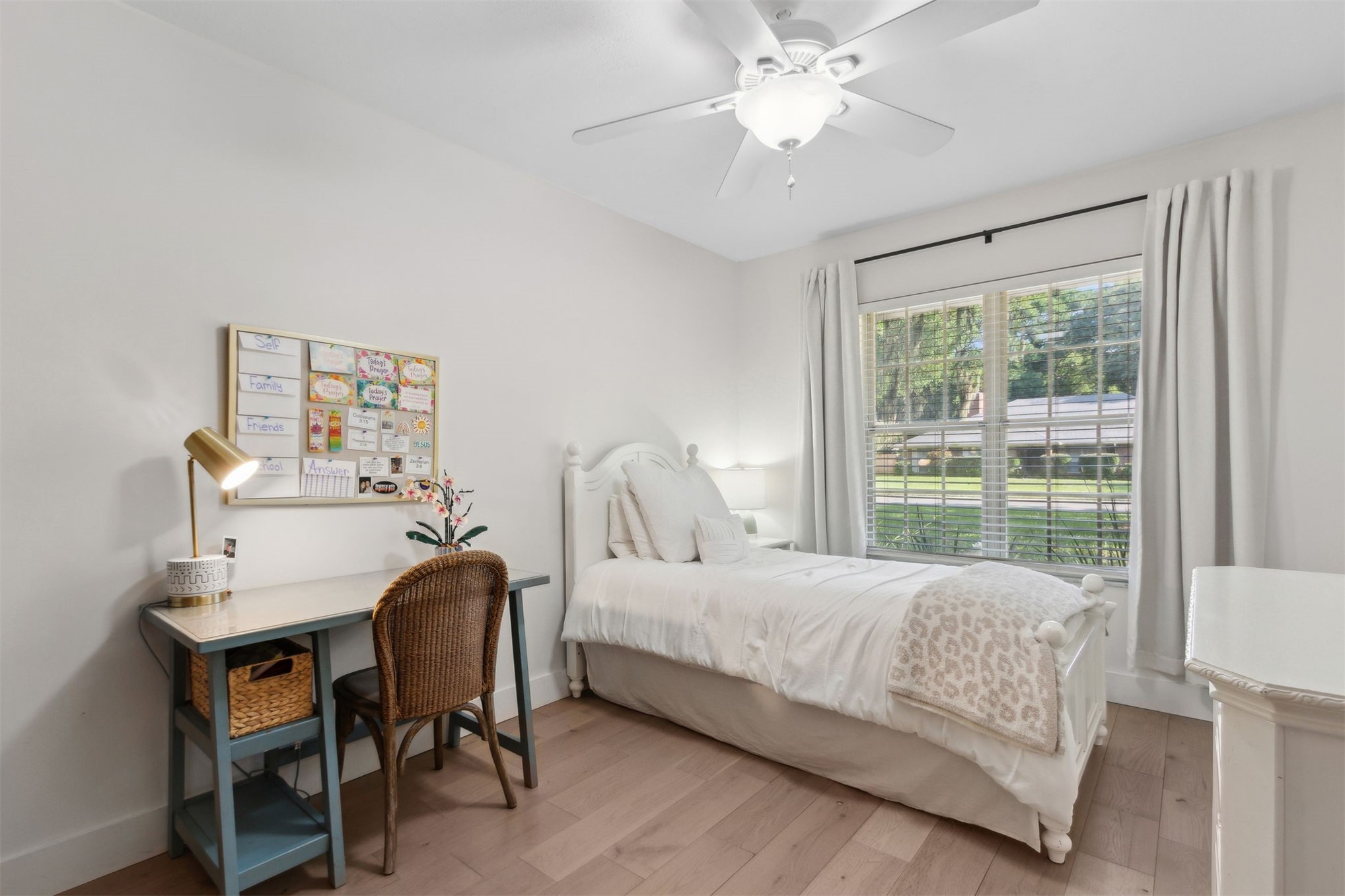 1908 Springbrook Road Fernandina Beach, FL 32034 - Photo 34 of 48 a bedroom with a bed and a table