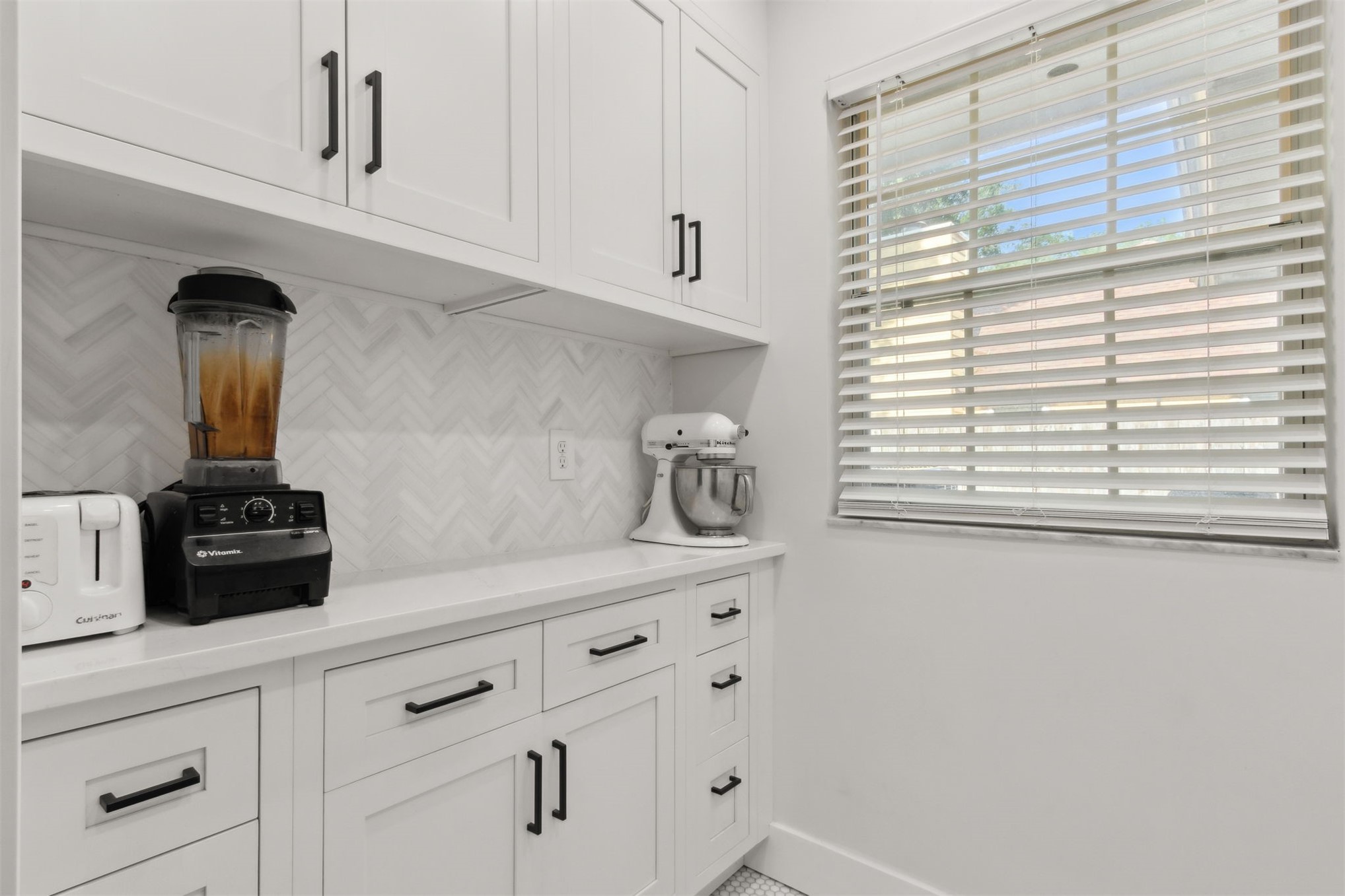 1908 Springbrook Road Fernandina Beach, FL 32034 - Photo 38 of 48 a kitchen with appliances cabinets and a window