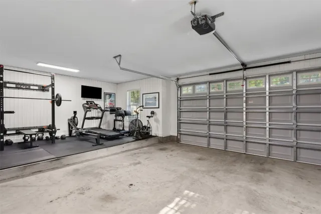 an outdoor space with furniture and umbrella