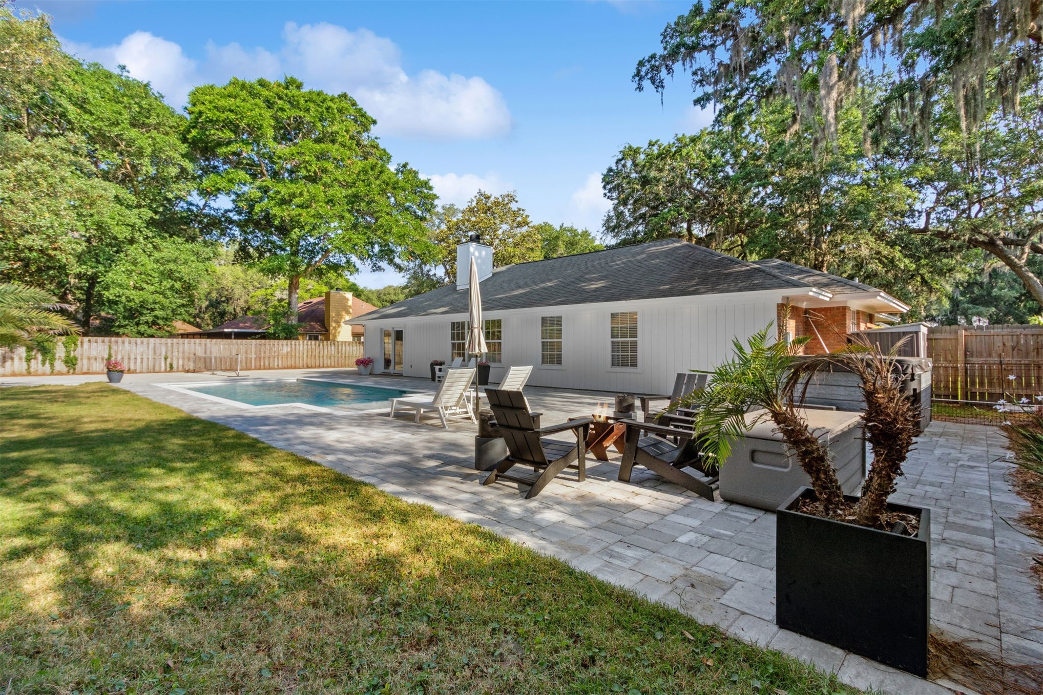 1908 Springbrook Road Fernandina Beach, FL 32034 - Photo 44 of 48 a view of a backyard with sitting area and furniture