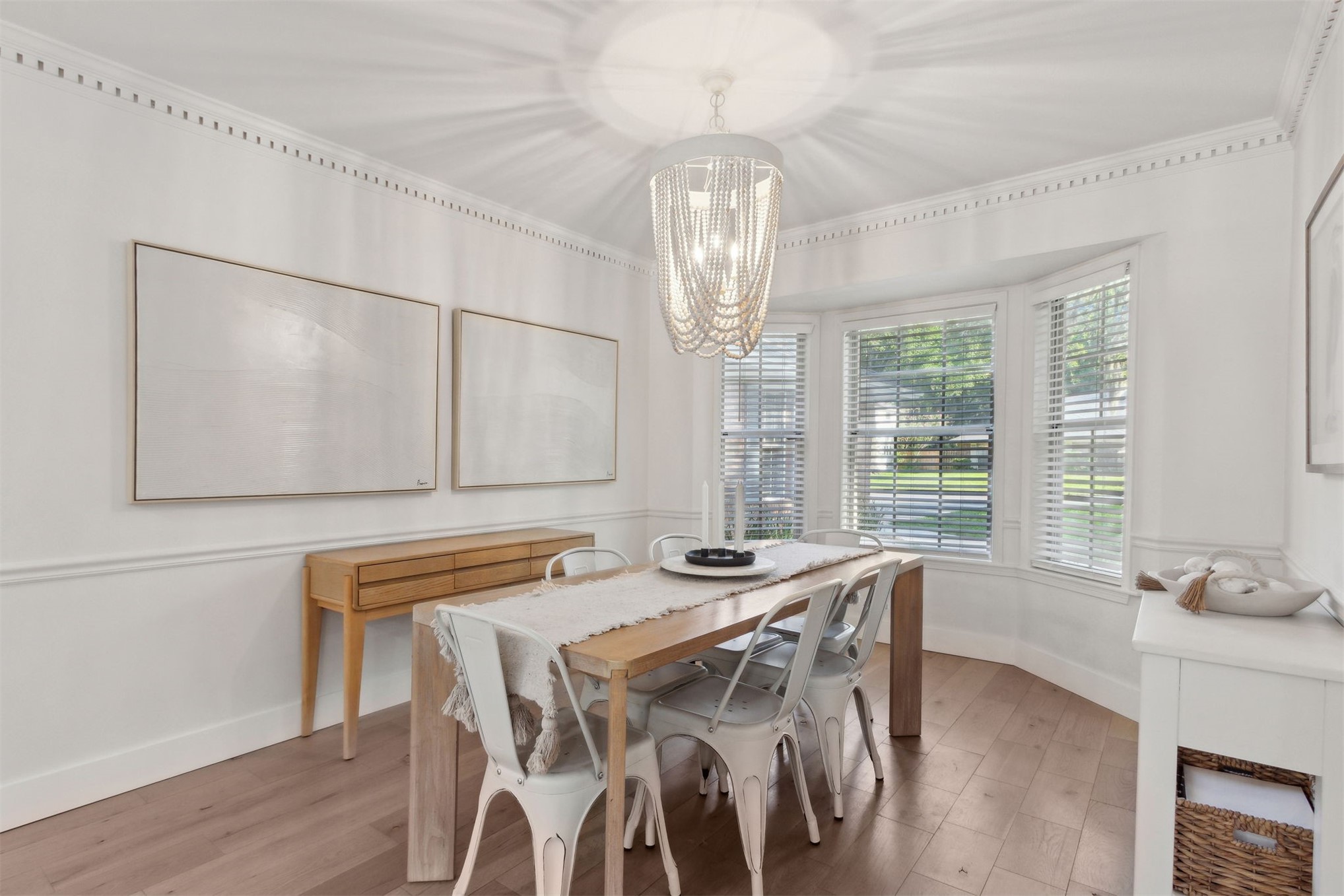 1908 Springbrook Road Fernandina Beach, FL 32034 - Photo 10 of 48 a view of a dining room with furniture a chandelier and wooden floor