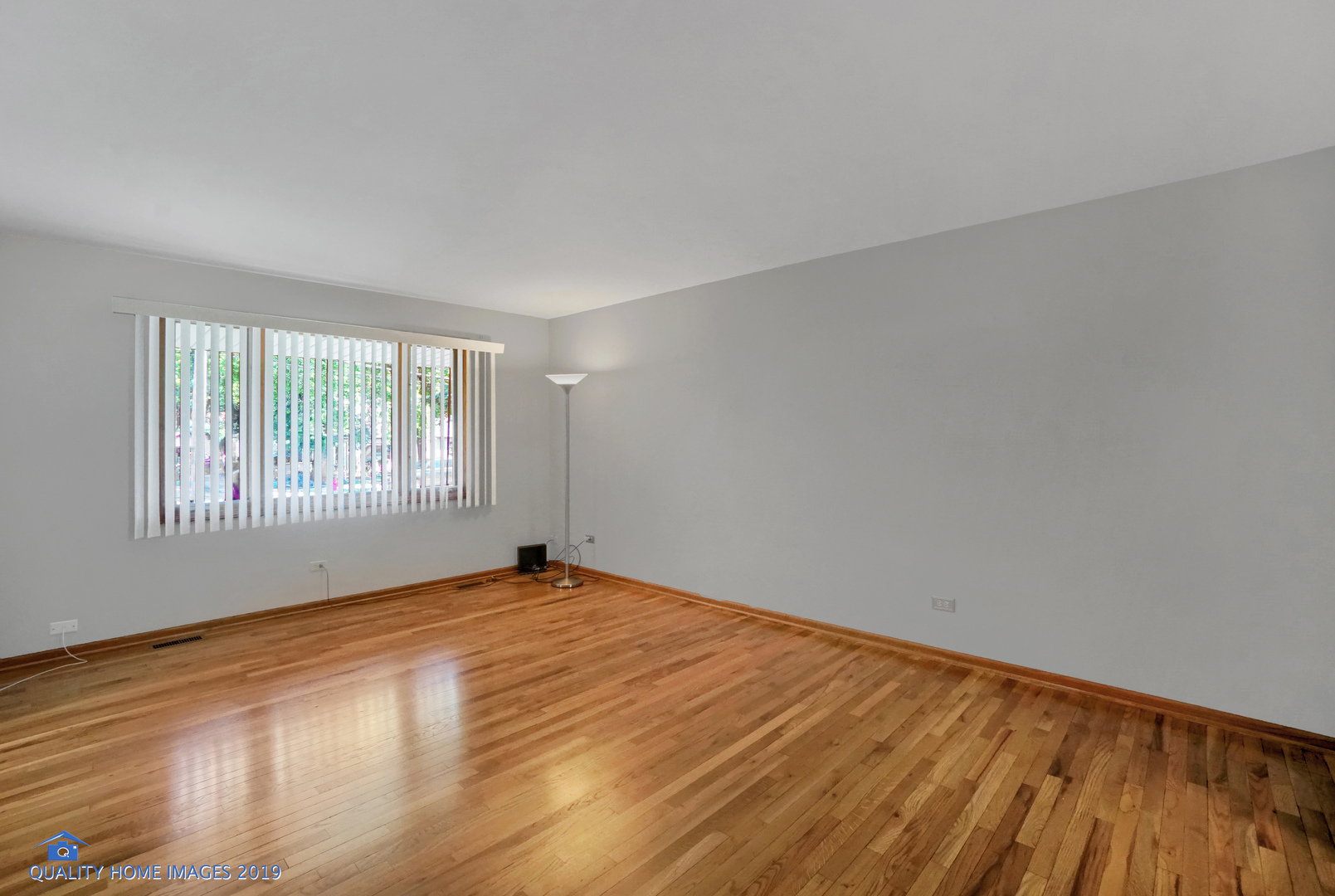 1529 Ridge Road Homewood, IL 60430 - Photo 8 of 28 a view of empty room with wooden floor and fan
