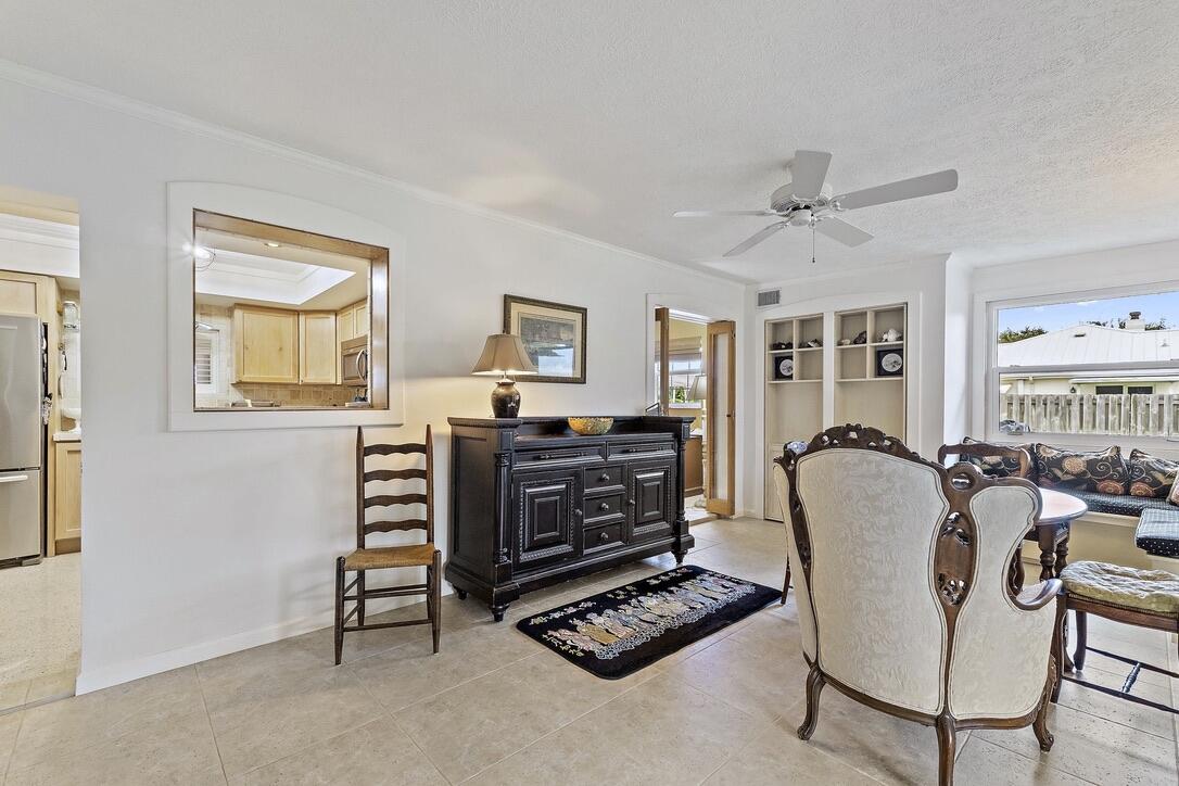 4844 Southeast Pilot Way Stuart, FL 34997 - Photo 12 of 41 a living room with furniture and a window