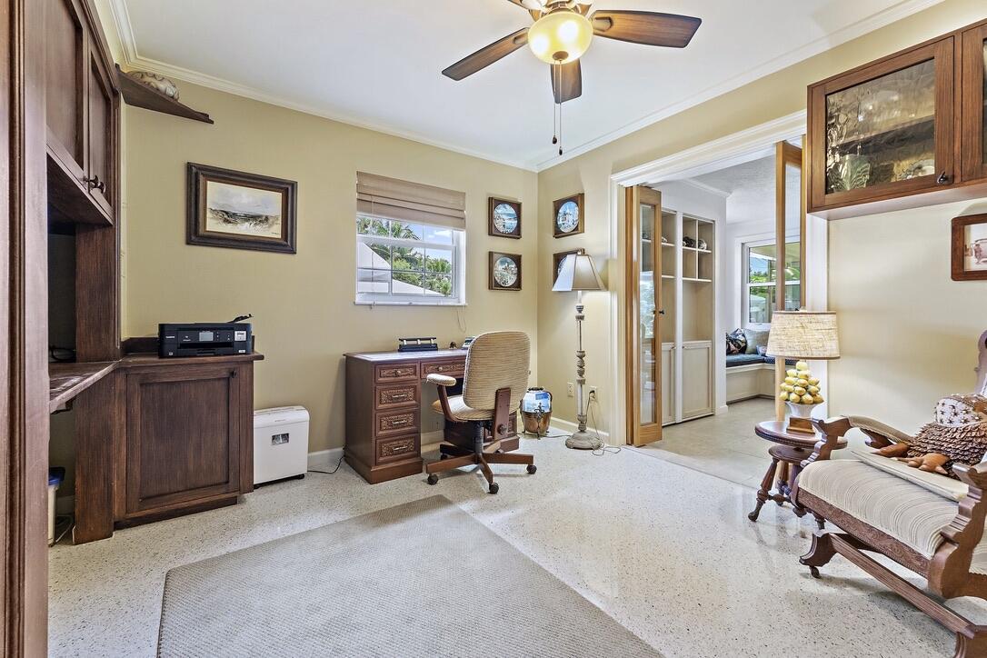 4844 Southeast Pilot Way Stuart, FL 34997 - Photo 22 of 41 a view of a livingroom with workspace and a window