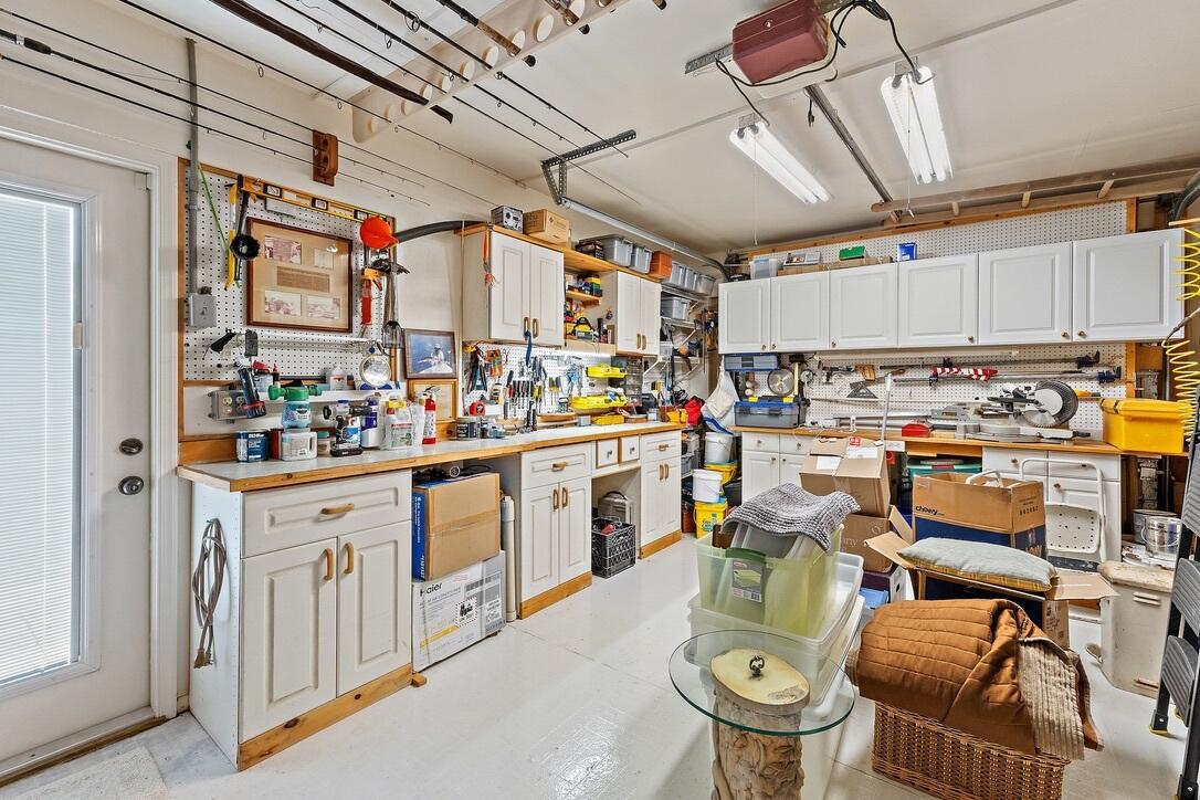 4844 Southeast Pilot Way Stuart, FL 34997 - Photo 34 of 41 a open kitchen with lots of appliances and cabinets