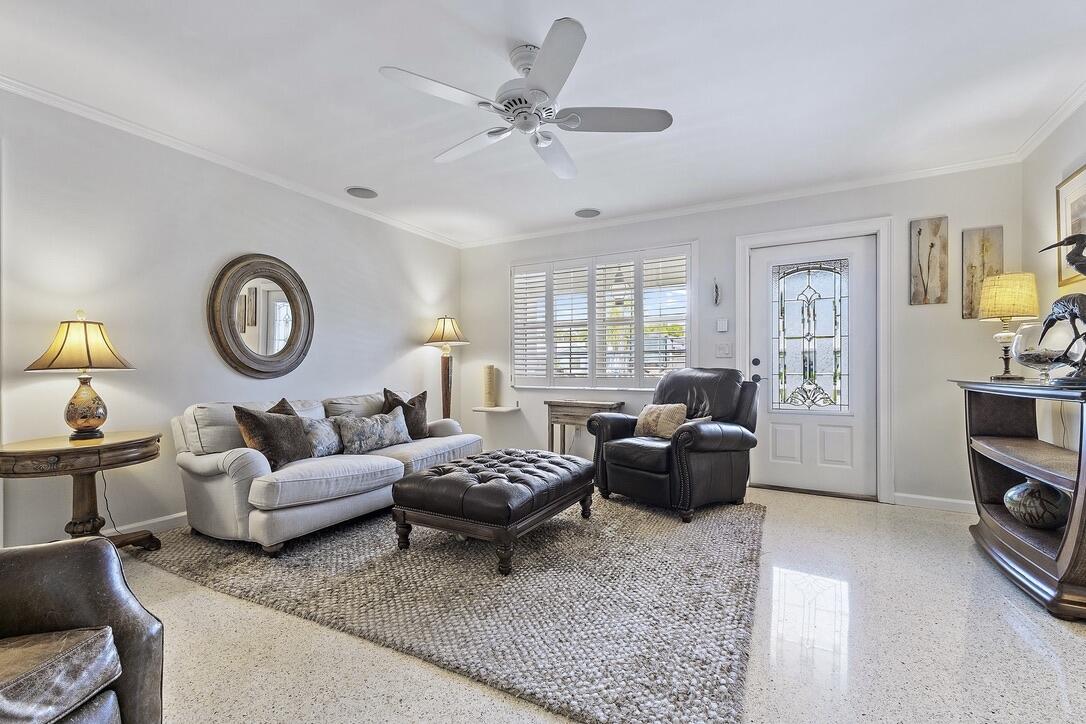 4844 Southeast Pilot Way Stuart, FL 34997 - Photo 6 of 41 a living room with furniture a rug and a window