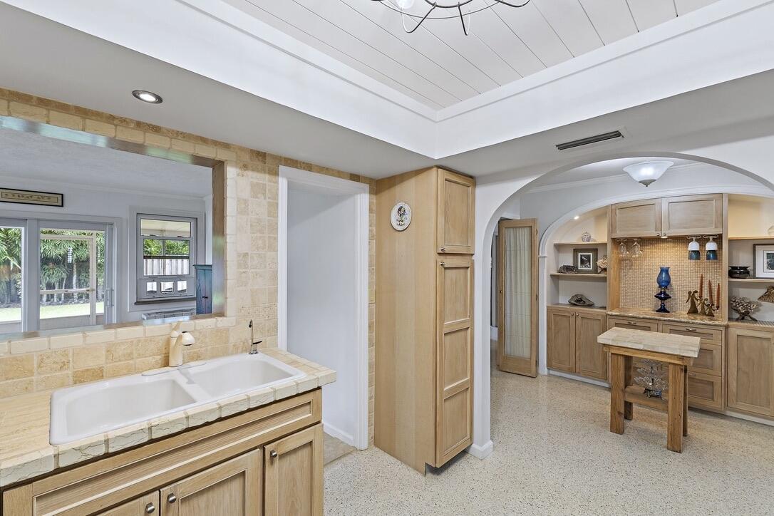 4844 Southeast Pilot Way Stuart, FL 34997 - Photo 10 of 41 a living room with furniture and a large window