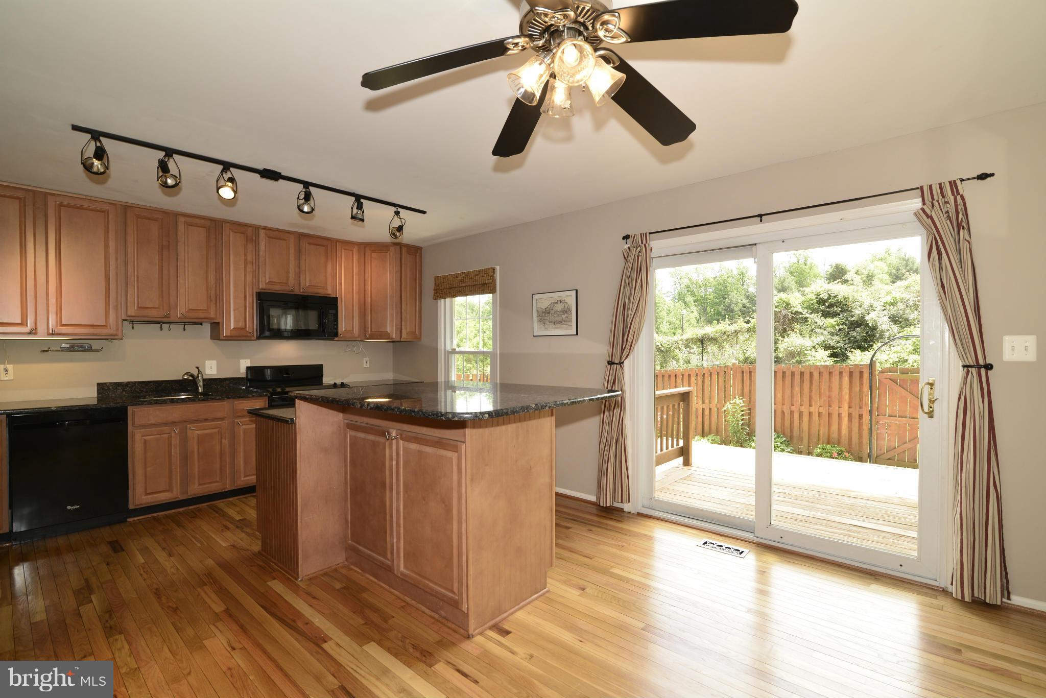 7435 Timberock Road Falls Church, VA 22043 - Photo 5 of 28 Granite counters and ample 42-inch cabinets
