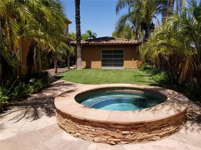 a view of outdoor space yard and swimming pool