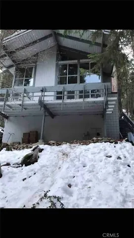 a view of a backyard of the house